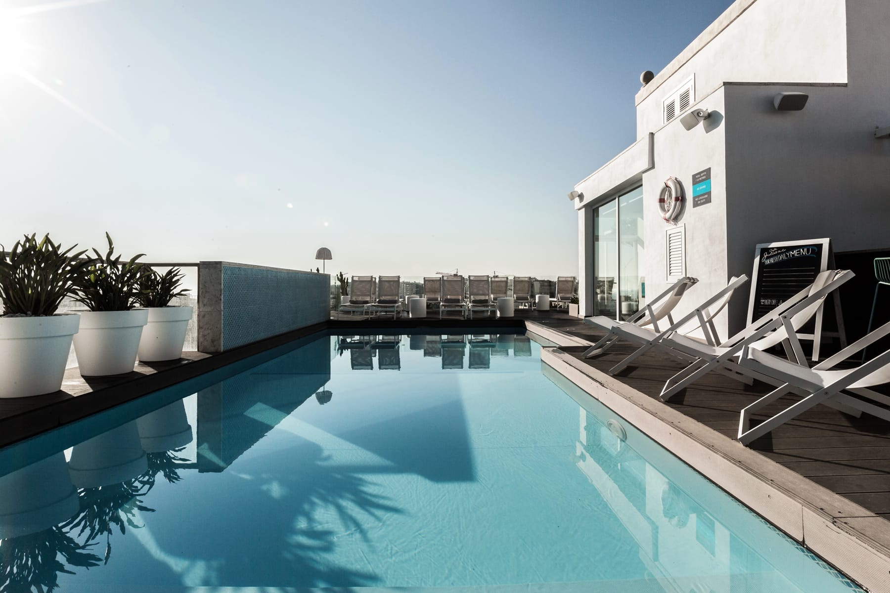 the luxury rooftop pool with views over St Juliani
